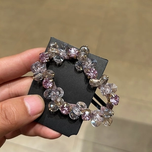 Handmade beaded hair clip with sparkling pink and grey crystals in gold claw settings