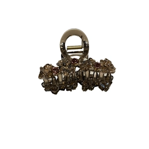 Elegant vintage crystal hair claw clip with brown and pink stones on golden metal base