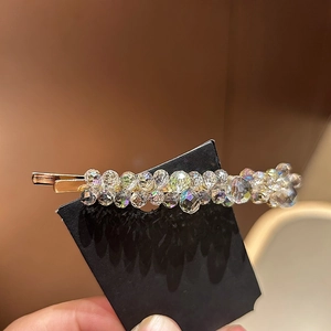 Exquisite handmade ice blue crystal hair clip with gold metal base for women's hairstyle