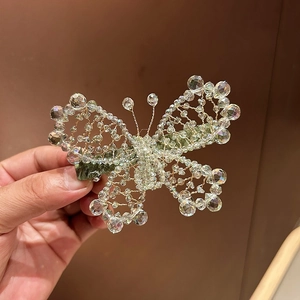 Elegant crystal butterfly hair clip with gradient beads and green satin base