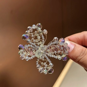 Handmade crystal floral hair clip with pastel beads and silk backing for elegant party styling