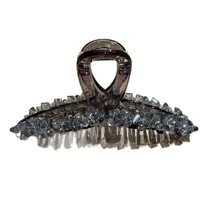 Elegant large crystal hair claw clip in translucent dark grey resin for thick hair styling