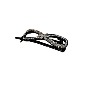 Elegant black twist hair clip with sparkling rhinestones and a 3D bow design