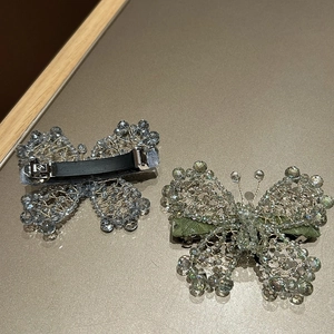 Exquisite handmade beaded butterfly hair clips with shimmering crystal gradients