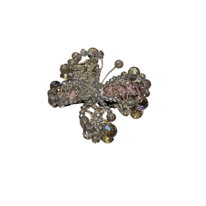 Handmade champagne crystal butterfly hair clip with beaded tassels and pink fabric wings
