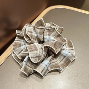 Classic British plaid oversized scrunchie hair tie in brown and blue checked pattern