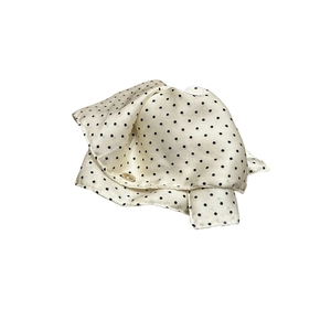 Polka dot hair claw clip with golden emblem and elegant satin ribbon ruffles