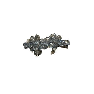Elegant blue crystal duckbill hair clip with sparkling floral cluster on silver base