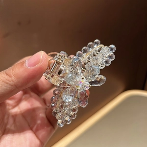 Pince à cheveux en cristal avec fleurs et ressort doré pour coiffure élégante femme