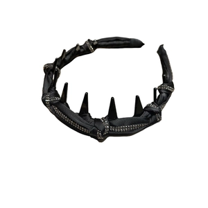 Gothic black spike headband with silver rhinestone accents for a punk hair accessory look