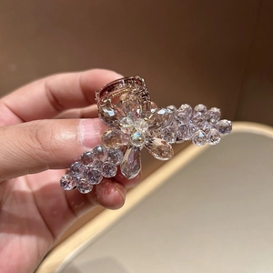 Serre-tête tressé en cristal avec strass violets étincelants et design tissé élégant