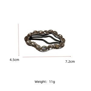 Detailed view of cloud-shaped rhinestone hair clip with 7.2cm x 4.5cm size dimensions