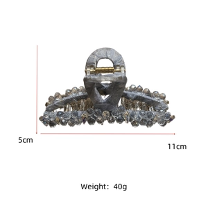 Detailed view of handmade grey satin hair claw with sparkling crystals and beads 11cm