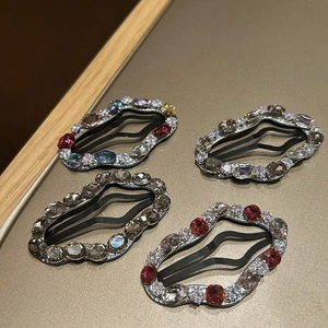 Luxury rhinestone teardrop hair clip set featuring four vintage gemstone color designs