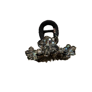 Elegant black crystal flower hair claw clip with three multi-faceted petals and rhinestones