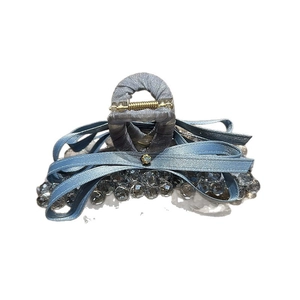 Elegant grey-blue crystal shark hair claw clip with satin ribbon bow and gold spring