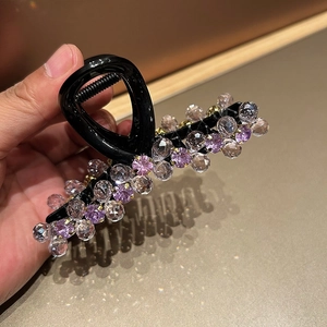 Elegant black claw clip with purple and clear crystal beads for women's hair styling