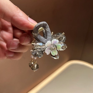 Pince à cheveux fleur en cristal étincelant avec poignée en tissu et glands pour femme