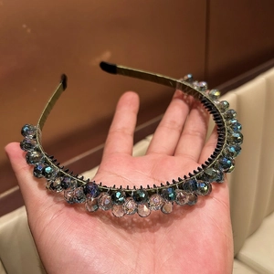 Luxurious heavy-duty crystal-wrapped headband with iridescent beads on a metal frame