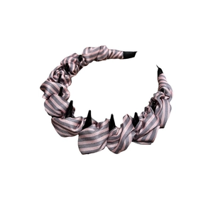 Cerchietto imbottito a righe rosa e grigio con dentini interni per una tenuta antiscivolo