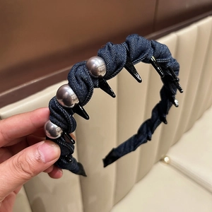 Denim headband with punk metal studs and silver beads for a stylish high skull top look
