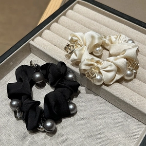 Elegant satin scrunchie set with pearls and crystals in black and champagne gold