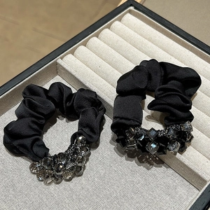 Elegant black satin scrunchies with crystal beads for high ponytail hairstyles
