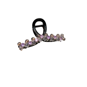 Elegant crystal beaded hair claw clip for women featuring purple rhinestones on black resin