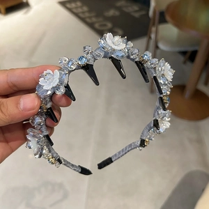 Elegant lily of the valley floral headband with blue crystal beads for hair styling
