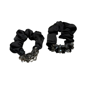 Elegant black satin scrunchies set with hand-sewn shimmering beads for hair styling