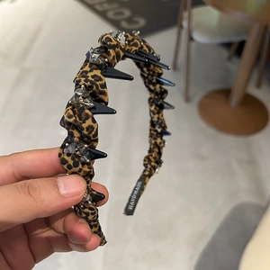 Leopard print headband with black studs and crystals for high cranial top hairstyle