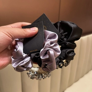 Elegant set of two satin scrunchies in lavender and black with luxury crystal beads