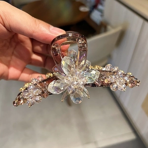Elegant flower crystal hair claw clip with rhinestones for a sweet luxury hairstyle