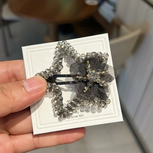 Barrette étoile en cristal bleu avec fleur en résille et clip en argent 925