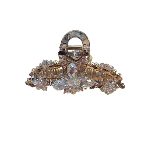 Amber crystal flower hair claw clip with sparkling rhinestones for elegant hairstyles