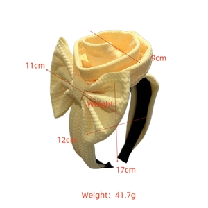 Detailed dimensions of yellow waffle fabric rose headband with a large bow decoration