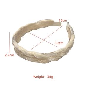 Detailed view of woven champagne crystal headband showing 15cm size and braided texture