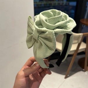 Fashionable light green floral headband with 3D rose and bow fabric design