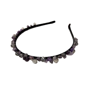 Handmade headband with purple crystals and grey beads on a black metallic frame