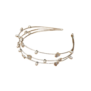 Elegant gold pearl headband with three-tier floral design and white pearls on white background
