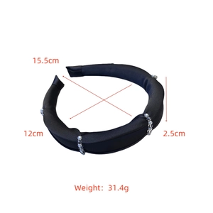 Detail view of black satin padded headband with pearl beads and dimensions of 15.5cm