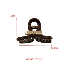 Brown plaid fabric hair claw clip with bow details showing size dimensions 8.4cm and 5cm