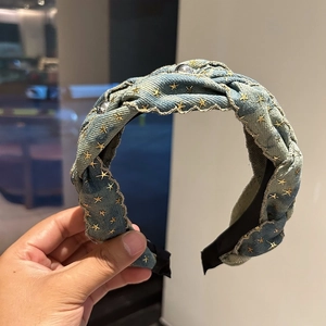 Braided denim headband with gold star embroidery and pearl accents for women