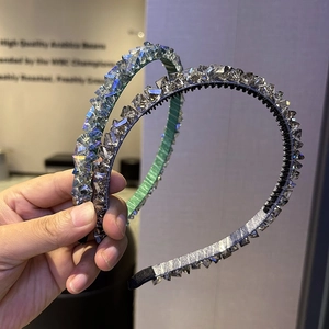 Sparkly crystal beaded headbands set in silver and light green with non-slip design