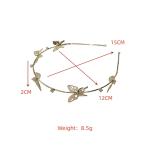 Detailed view of lightweight golden headband with hollow butterflies and zircon inlay