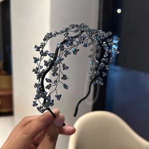 Exquisite blue crystal beaded headband with handcrafted branch design on a metal frame