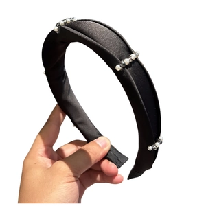 Elegant black satin padded headband with crystal pearls and bead embellishments
