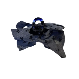 Elegant large grey bow hair claw clip with black butterfly patterns for bun hairstyles