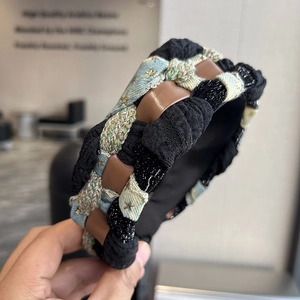 Braided wide headband featuring denim with gold stars and mixed fabrics for women