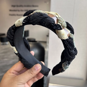 Handmade woven headband featuring starry denim fabric and multi-material braid design